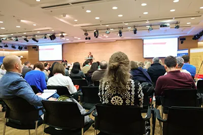 Community hall with people at a meeting